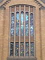 A closeup of the stained glass windows at Corpus Christi Catholic Church.