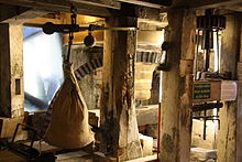 Interior of the Lyme Regis watermill, UK (14th century). WaterMill Interior MotionBlur.jpg