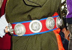 Tibetan woman's traditional studded belt at TCVs 50th anniversary. 2010