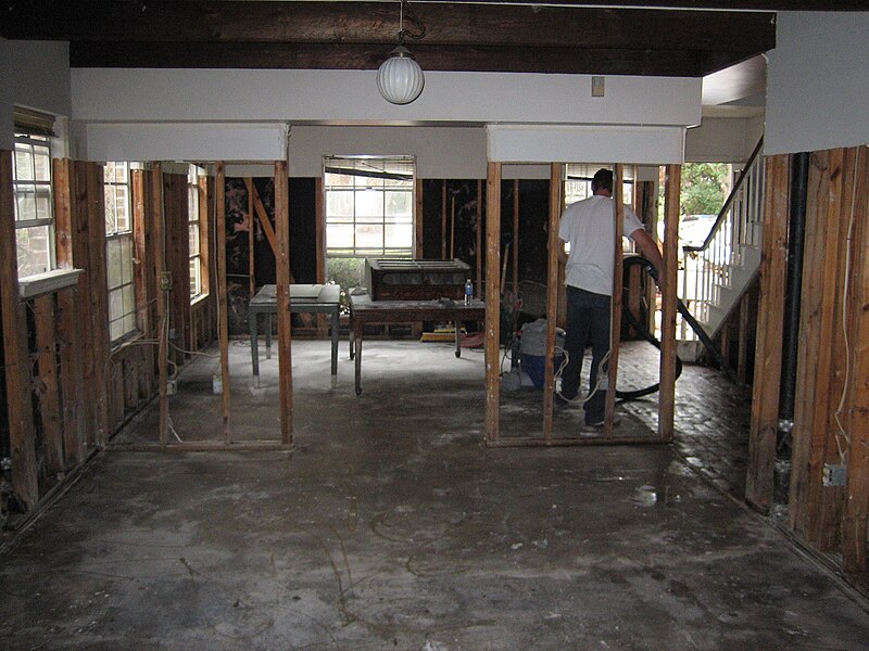 File:WorkerCleaningGuttedDownstairs.jpg