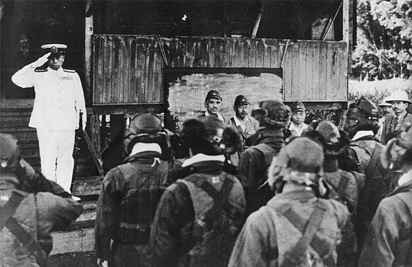 Admiral Isoroku Yamamoto saluting Japanese naval pilots at Rabaul, hours before his death