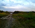 Вид з бетонної дороги на озеро Домбровського кар'єру