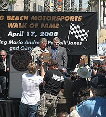 City of Long Beach City Manager Pat West presenting Long Beach Motorsports Walk of Fame plaque to Mario Andretti on April 17, 2008 0953 West Andretti 2008.jpg