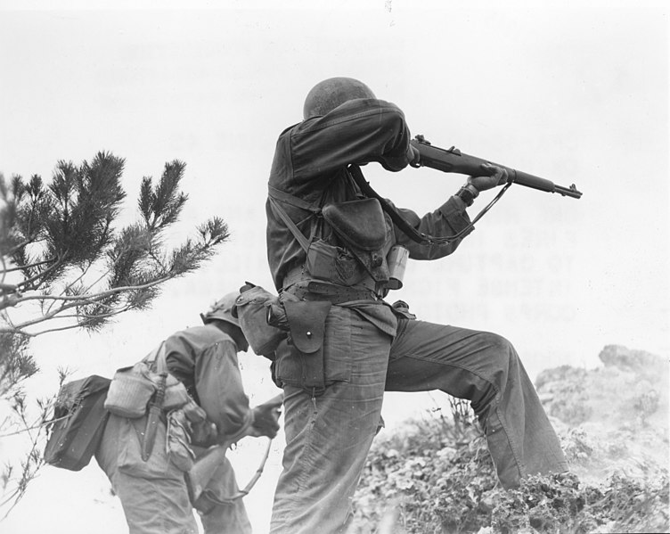 File:111-SC-337972 - One rifleman reloads, and another fires in the 96th Infantry Division's advance to capture Big Apple Hill, scene of intense fighting on Okinawa.jpg
