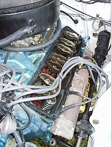 1969 AMC V8 overhead valve engine. The rocker cover has been removed, so the pushrods, rocker arms and valve springs and valves are visible 1969 AMC SCRambler valv.jpg