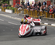 Sidecar TT Race 1 winners Tim Reeves and Daniel Sayle 2013 Isle of Man TT 6.jpg