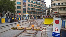 Temporary or 'Californian' points installed on tramline 81 at the junction of Avenue Louise and Rue Bailli (in French)
, a.k.a. Louisalaan and Baljuwstraat (in Dutch)
, Brussels 20180711 aiguillage californien at Bailli 2.jpg