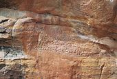 Old-Kannada inscription dated 578 CE (Badami Chalukya dynasty) outside Badami cave temple no.3 6th century Kannada inscription in cave temple number 3 at Badami.jpg