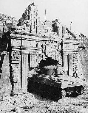 An M4 Sherman tank entering the ruins of Fort Santiago