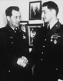 U.S. Air Force pilot Capt Lyle Bordeaux (r.) receiving the Purple Heart and Silver Star from Brig Gen Joe W. Kelly during the Korean War. A USAF Hospital in Japan-Capt Lyle B. Bordeaux (right), Bowling Green, OH, USAF B-29 pilot, receives the Silver Star, and the Purple Heart, from Brig Gen Joe W. Kelly, FEAF Bomber Command Chief, plus HF-SN-98-07469.jpg