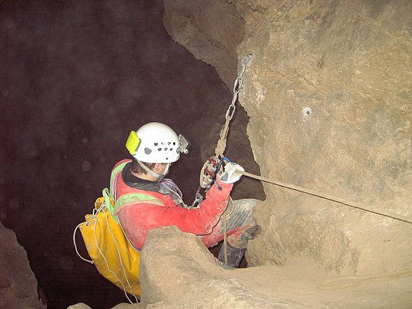 Cave abseils can be long and might have to be done using ropes with varying degrees of friction, using a device such as a brake bar rack