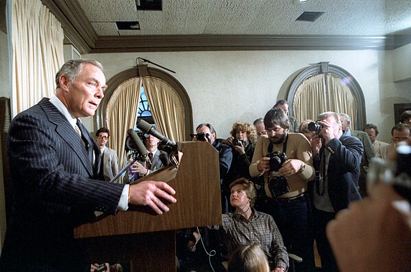 Secretary of State Alexander Haig speaks to the press about the shooting.