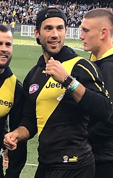 Rance celebrates with teammates following Richmond's 2019 Grand Final victory which he missed due to injury Alex Rance - Grand Final.jpg