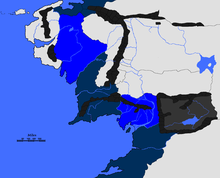 Království Dúnadanů ve vyhnanství (modře) a ostatní kolonie Númenoru (tmavě modře), krátce po zkáze Númenoru. 3320 D.v.