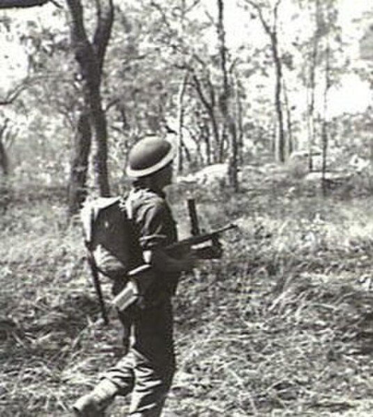 A soldier from the 2/6th with an Owen gun during an exercise in Queensland, April 1944