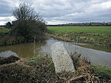 Inscribed with 'BB 18' (Bexhill Borough). At the time of the incorporation of Bexhill Borough in 1902, the boundary was marked out by 63 large stones placed along the perimeter from Normans Bay on the west, through Lunsford Cross on the north of the town and Glyne Gap on the east, also the Hastings county borough boundary.