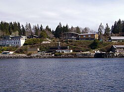 Clockwise from top left: whale lab, main building, cafeteria, Rix Centre, boat shed, COTC lab, ecophysiology lab, cable tank, pump station Bamfield Marine Sciences Centre.jpg