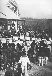 The British flag being raised in 1883 after Queensland annexed the southern part of New Guinea British flag raised on new guinea annexed by queensland.jpg
