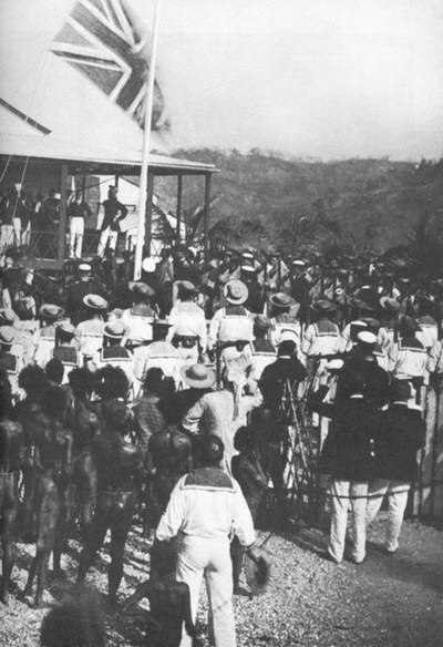 The British flag being raised in 1883 after Queensland annexed the southern part of New Guinea