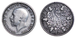 Obverse and reverse of the 1928 sixpence, depicting George V British sixpence 1928.png