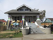 As parades and large gatherings were canceled for the 2021 Mardi Gras season in New Orleans, some locals spent extra effort to decorate their homes and front yards for the holiday. Some nicknamed this "Yardi Gras". Broadmoor, New Orleans, Feb 2021 04.jpg