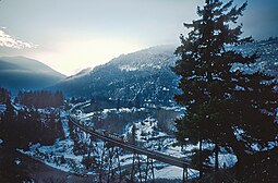 CN 5276 eastbound on the Anderson River bridge between Hicks and Boston Bar on the CN Yale Sub., BC, Canada in November 1984 (29016415370).jpg