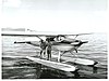 Captain Fred Ladd and Pat Burstall with fish caught while trolling from the float of the Cessna 185, Lake Taupo (25387178184).jpg