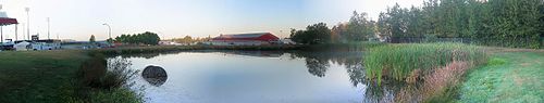 The Fairgrounds at dawn. To the left is the Stetson Bowl Stadium; the Show Barn (white) and the Agriplex (red) are at centre. Cloverdalefairgrounds-pano.jpg