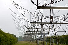 Detail of the remains of the 4C Array, with antennas of the One-Mile Telescope in the background