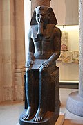 Colós a nom de Ramsès II procedent de Tanis. Louvre.