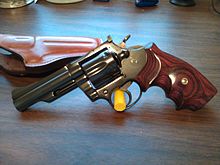 Colt Trooper Mk III, (circa 1980) with a 4" barrel and aftermarket wood grips Colt Trooper Mk3.jpg