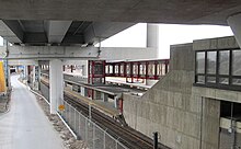 Community College station is built under the double-decked elevated I-93 highway Community College station from under I-93, January 2013.jpg