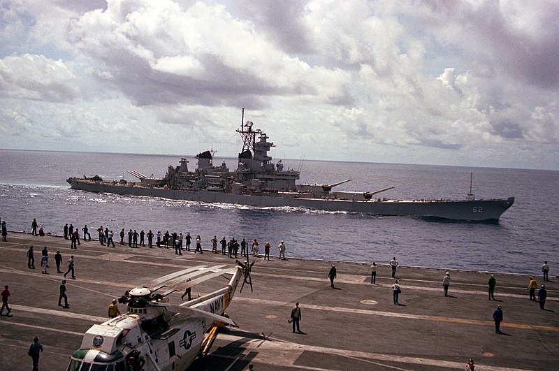 File:Crew members aboard the aircraft carrier USS MIDWAY (CV-41) watch from the flight deck as the battleship USS NEW JERSEY (BB-62) comes alongside the carrier - DPLA - 3d5386ec9d1b6a70b0acb1b32503b804.jpeg