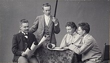 Armas Lindgren, Eliel Saarinen and Herman Gesellius in the late 1890s (with Albertina Ostman) Daniel Nyblin - Architects Lindgren, Saarinen, Ostman and Gesellius.jpg