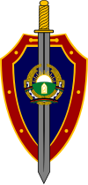 El emblema de la central de inteligencia llevaba el escudo nacional, por lo que fue modificado cuando en 1987 éste tuvo cambios.