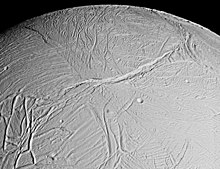 View of Enceladus's Europa-like surface with the Labtayt Sulci fractures at center and the Ebony (left) and Cufa dorsa at lower left; imaged by Cassini on February 17, 2005