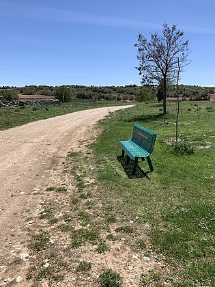 A bench in nowhere provided by a bank that no longer exists. Quintanilla de los Caballeros