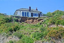 Erosion of the boulder clay (of Pleistocene age) along cliffs of Filey Bay, Yorkshire, England Erosion of Boulder Clay in Filey Bay.JPG