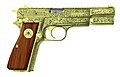 Пістолет Browning Hi-Power з дамаскінажем, який належав Муаммару Каддафі.