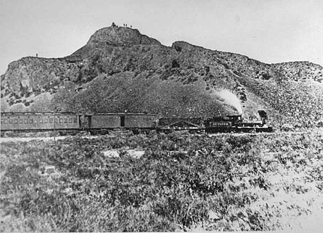 The Jupiter leads the train that carried the spike, Leland Stanford, one of the "Big Four" owners of the Central Pacific Railroad, and other railway officials to the Golden Spike Ceremony.