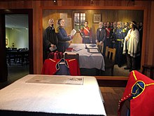 Depiction of the proclamation establishing the colony of British Columbia by Governor James Douglas at Fort Langley National Historic Site FortLangleyBigHouse-InsidePicture.JPG