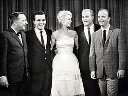 Crosby (right) with Garry Moore, Betsy Palmer and his brothers Lindsay and Phillip on I've Got a Secret in 1961