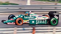 Benetton Formula made their entrance in F1. Gerhard Berger 1986 Detroit.jpg