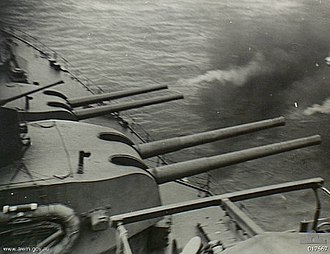 Shropshire's forward turrets firing during the Battle of Morotai HMAS Shropshire Morotai 017667.jpg