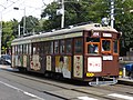 『マッサン』ラッピング広告電車となった阪堺電軌161形電車164