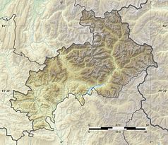 Mapa konturowa Alp Wysokich, u góry nieco na prawo znajduje się owalna plamka nieco zaostrzona i wystająca na lewo w swoim dolnym rogu z opisem „Lac de l’Eychauda”