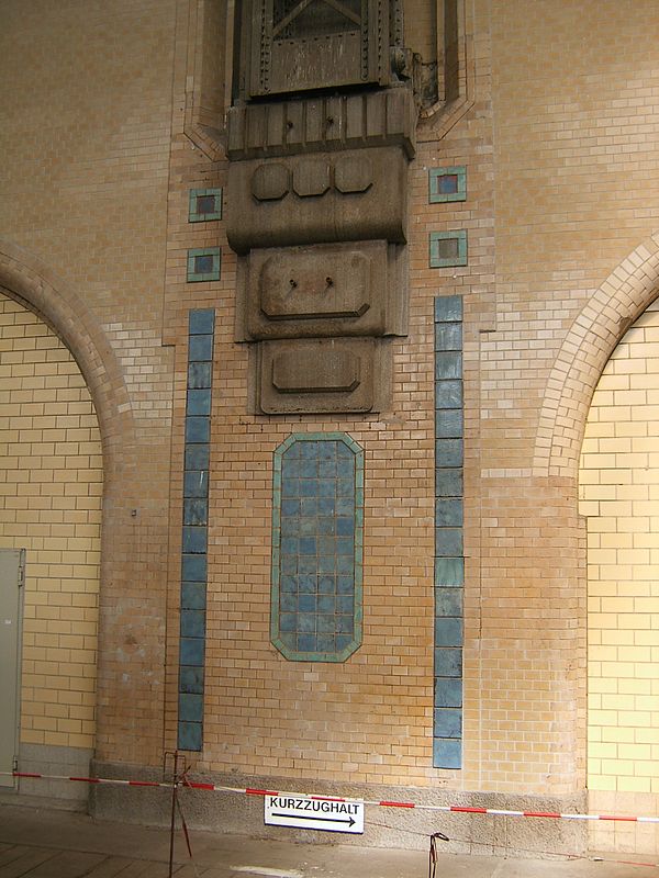 Detail of part of a wall in Hamburg Hauptbahnhof: bolts used to attach a mast for the overhead power lines.