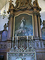 side altar with painting of the Ascension of Our Lady copy of Murillo