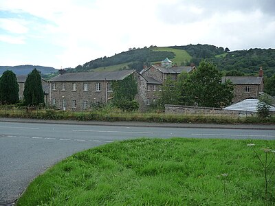 Buildings originally built as Llanfyllin workhouse, a state-funded home for the destitute which operated from 1838 to 1930.[91][92]