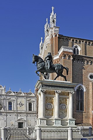 The monument with the hospital and the basilica of San Giovanni e Paolo